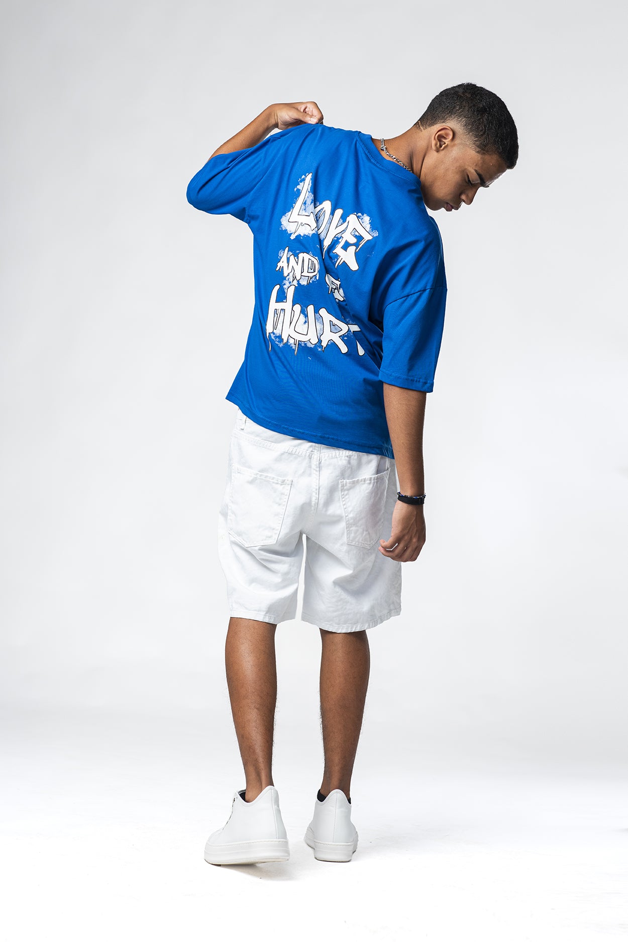 T-shirt azzurra con stampa Love Get Hurt Effemme