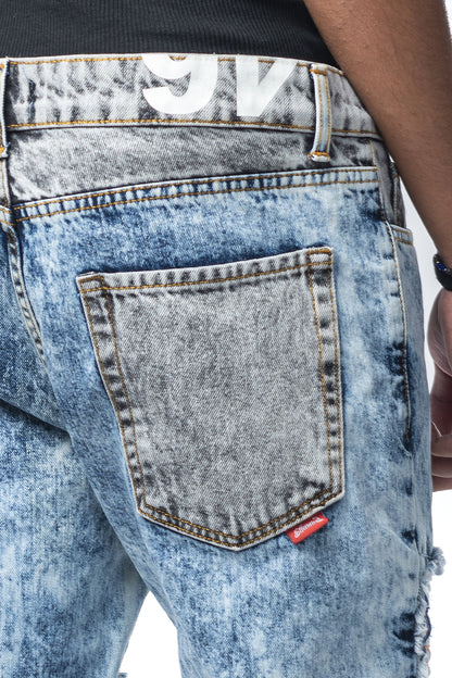 Jeans modello biker chiaro con strappi e rotture cucite Effemme