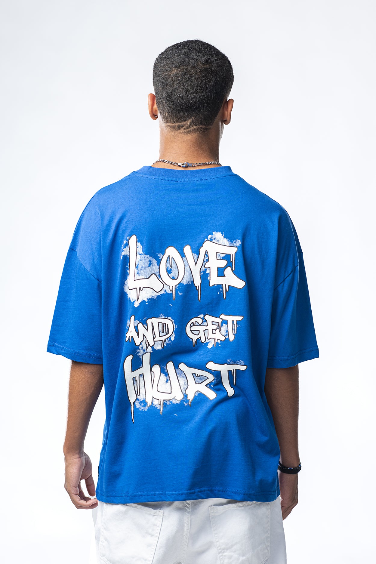 T-shirt azzurra con stampa Love Get Hurt Effemme