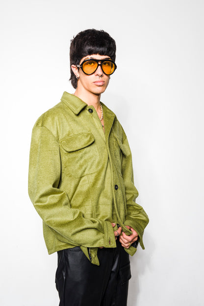 Green cloth jacket with contrasting buttons and pockets